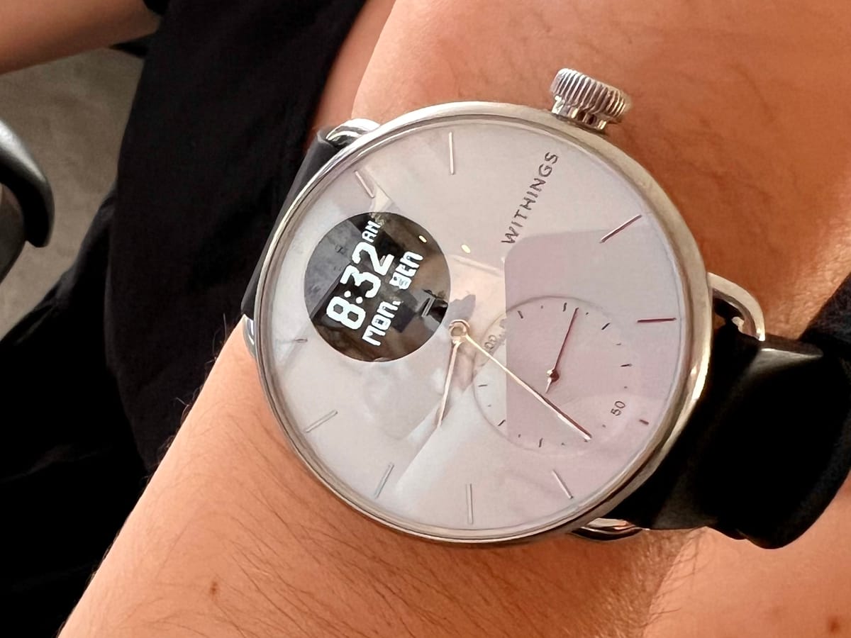 A white Withings ScanWatch 2 worn on a wrist